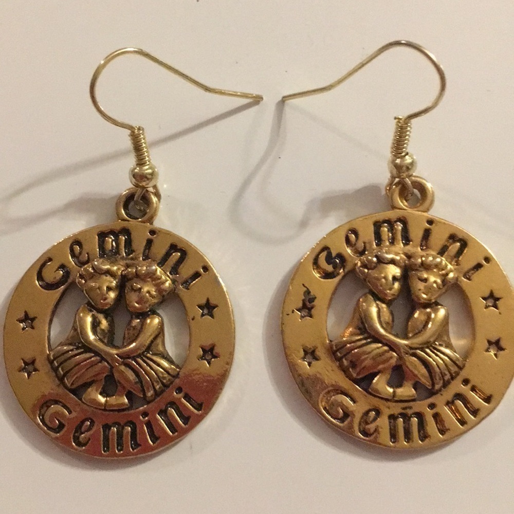 Gemini gold tone dangle earrings (N)